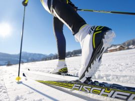 With cross-country skis at San Cassiano